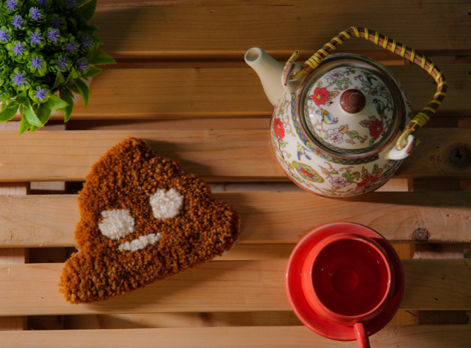 Tufted Poop Emoji Coaster by The Clumsy Studio